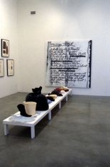 Mike Kelley and Tony Oursler, Things to Get, 1997. Found objects on wood platform, spray paint, enamel paint on canvas; platform: 12 x 25-3/8 x 162 inches, painting: 84 x 83 inches. MP 1