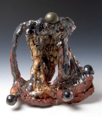 Pyrite Fourchette, 2007. Ceramic, bronze sphere, formica pedestal. Sculpture - 16 x 17.5 x 5 inches (40.6 x 44.5 x 12.7 cm); pedestal: 40 x 25 x 17 inches (101.6 x 63.5 x 43.2 cm). MP 38