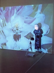 Fear Flower, 1999. Two LCD projectors, 2 VCRs, 2 videotapes, tripod, cloth, stand, performed by Tracy Leipold, dimensions variable. MP 270