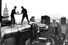John Loengard, Annie Leibovitz and her assistant Robert Bean on the Chrysler Building, New York, 1991