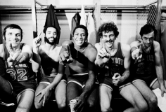 George Kalinsky, The Knicks at the NBA Championships: Jerry Lucas, Walt Frazier, Willis Reed, Phil Jackson, and Bill Bradley seated in locker room, Los Angeles, 1973