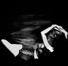 Lillian Bassman The Line Lengthens, model unknown, lingerie by Lily of France, 1955