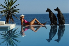 Slim Aarons, Pantz Pool, 1985: Laura Hawk, assistant to the photographer, relaxes by the pool at El Rincon, the von Pantz' Marbella home