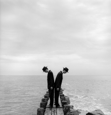 Rodney Smith, Twins Leaning outward on dock no. 1, Sherwood Island, Connecticut, 1997