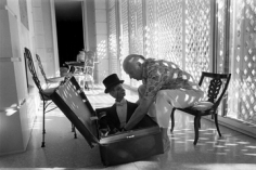 Mary Ellen Mark, Edgar Bergen takes Charlie McCarthy out of his suitcase, Los Angeles, California 1978