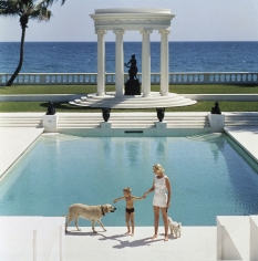 Slim Aarons, The Good Life, 1955: C.Z. Guest and her son Alexander and dog at the pool at their home Villa Artemis in Palm Beach