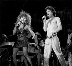 Ron Galella, Tina Turner and Mick Jagger during Live Aid Concert, JFK Stadium, Philadelphia, 1985