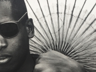 Man with umbrella by Tim Greathouse