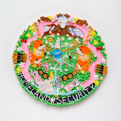 a round painting with high-relief acrylic piping. the bottom of the painting reads 'homeland security', among a field of grass. two pink slides are on either side.