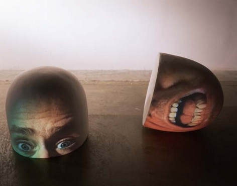 Half (Brain), 1998. Two Sony CPJ 200 projector, 2 videotape, 2 Samsung VCR, polystyrene foam, paint, performance by Tony Oursler, 14 x 13 x 13 inches (35.6 x 33 x 33 cm) each. MP 241
