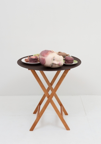 Josh Kline, 15% Service (Applebee's Waitress' Head), 2018. 3D-printed sculptures in plaster with inkjet ink and cyanoacrylate, custom tray, wooden stand, 38 1/4 x 28 1/2 x 28 1/2 inches (97.2 x 72.4 x 72.4 cm).
