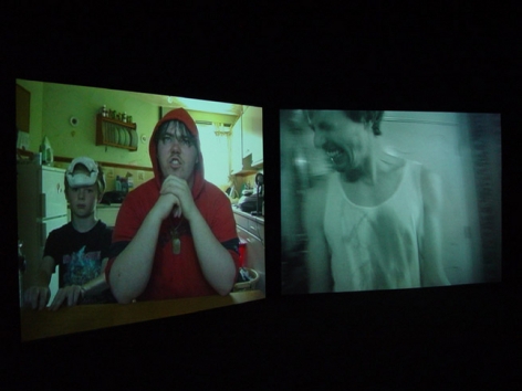 Installation view from "Home," 2003. Dual screen DVD shot with digital camera, 32 minutes. Edition of 5. MP V-7