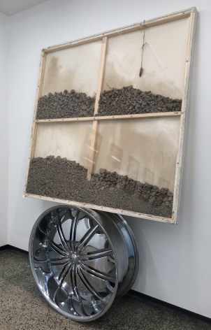 (38° 44′ 18.49″ N, 90° 16′ 25.93″ W), 2017 Giganotosaurus tooth, soil from Palestine, Malcolm X's birthplace, Ferguson Missouri, alloy wheel, canvas