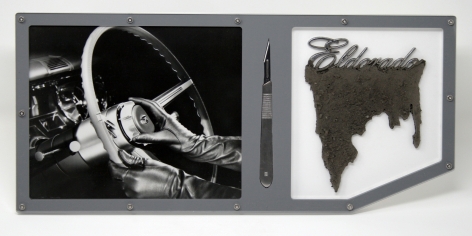 Benjamin Kelley Untitled 05 2019, Cadillac factory photograph (original), stainless steel scalpel, Cadillac Eldorado script emblem with earth, acrylic, stainless steel hardware, 7.75 x 16.75 x 1 inches.