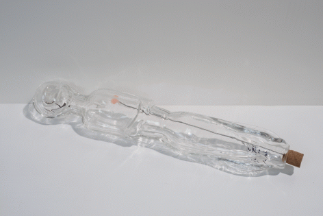 Fred Holland "Woman on the Wire", 2015 Cast glass, wire, cast silver wishbone, and cork 2-1/2 x 17 x 3 inches
