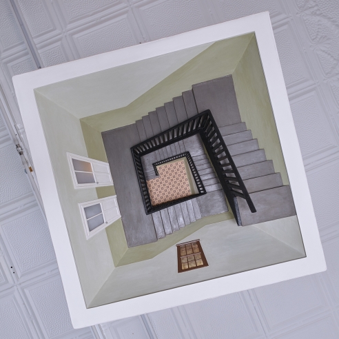 a sculpture of an overhead lamp with a descending stairwell hidden inside
