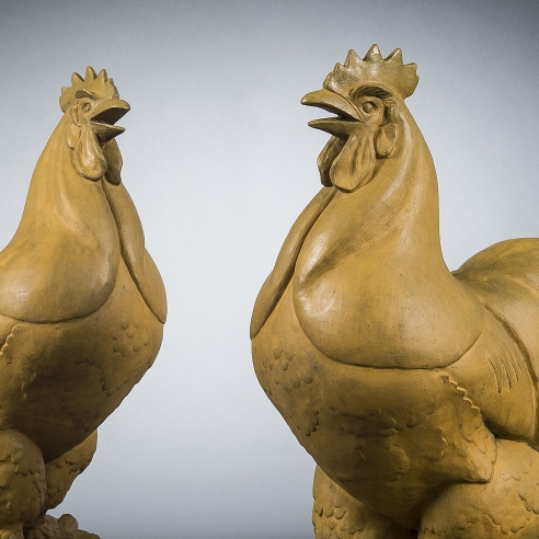 WHEELER WILLIAMS (1897–1972), Pair Gatepost Roosters, 1932. Terra cotta, 34 in. high (detail).