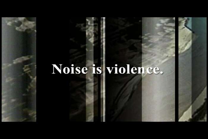 Tony Cokes, Headphones, 2004 (still)