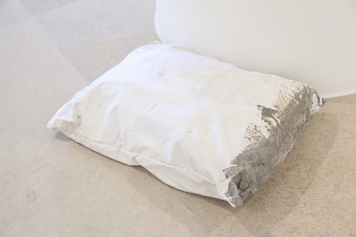 Gerry Bibby, Concrete Nightmares, 2016, Fabric, concrete, concrete bag, 5 x 21 1/2 x 17 3/4 inches (12.7 x 54.6 x 45.1 cm)
