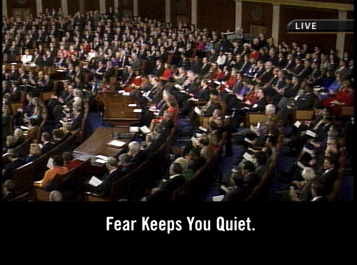 Tony Cokes, Evil.6 (Faking), 2005 (still)