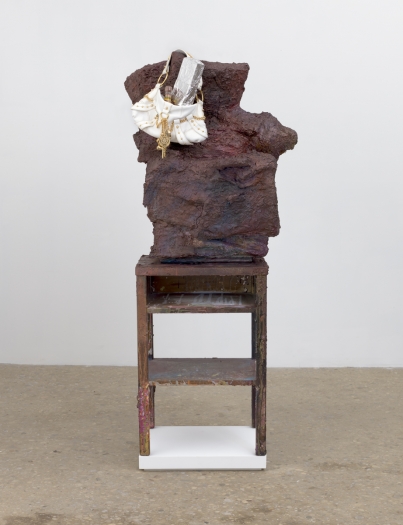 Rachel Harrison Sculpture with Hot Sauce, 2018 Wood, cardboard, polystyrene, cement, foam, burlap, acrylic, aluminum foil, hot sauce, and Baby Phat handbag 64 3/4 x 32 x 25 inches (164.5 x 81.3 x 63.5 cm)