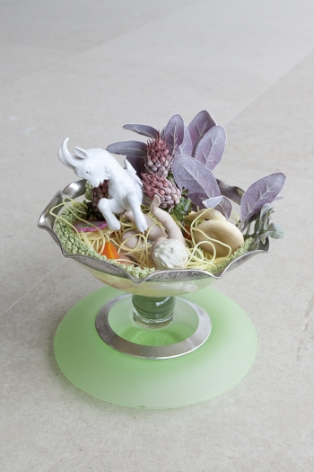 Hayley Silverman Courage, 2017 Scalloped serving bowl, polyurethane food ingredients (soba noodles, shiitake mushrooms, radish, carrots), epoxy resin, porcelain figurine, plastic flora, LED base 7 1/2 x 11 1/2 x 11 1/2 inches (19.1 x 29.2 x 29.2 cm)