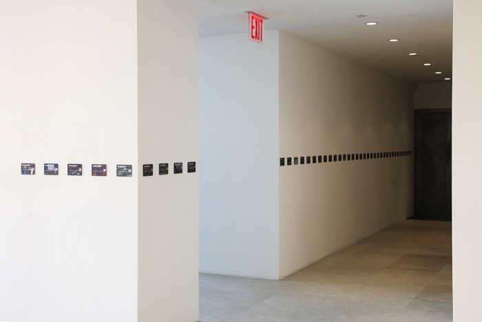 John Knight Worldebt, 1994 Lithography on aluminum 165 parts, 3 1/8 x 5 1/8 inches (8 x 13 cm) each