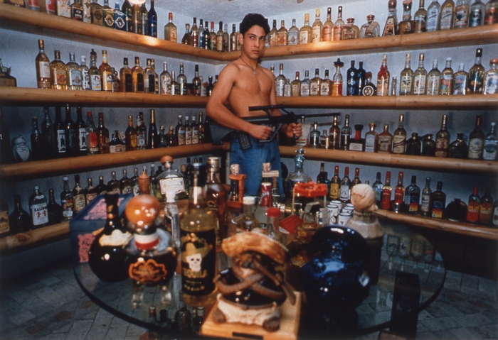 Daniela Rossell, Untitled (Emiliano's Tequila Collection), 1997, cibachrome, 11 x 16 inches, edition of 5