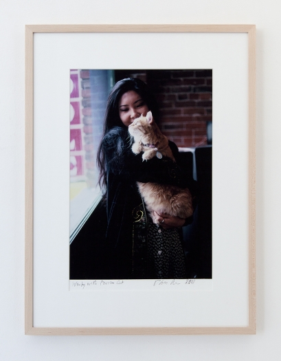 Dan Graham Wendy with Persian Cat, 2001 Color photograph Photo: 13 5/8 x 9 3/8 inches (34.6 x 23.8 cm) Frame: 20 x 15 inches (50.8 x 38.1 cm)