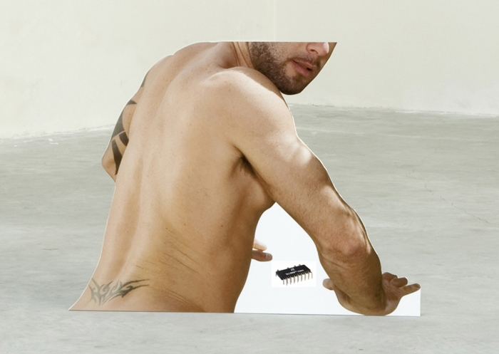Free Market, 2012 found image of Orlando Toro, found image of a SLLIMM-nano intelligent power modules produced at STMicroelectronics factory in Catania, digital print on PVC, cutout advertisement display 95 cm x 70 cm x 10 cm