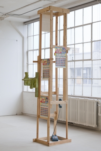Some Dreamers of the Golden Dream, Rachel Harrison, Telephone Booth, 2009, Wood, polystyrene, cement, acrylic, calling-card posters, thumbtacks and rotary phone, 109 x 30 x 23 inches