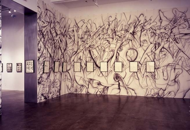 The Inky Depths (installation view), 2005. 26 ink and pencil drawings on paper, 2 airbrushed sheets of fabric, 2 portable stereos, 6 lights, 2 disco balls, dimensions variable. MP 157