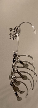 Adeela Suleman, Case 3, 2008, Steel drain covers, steel tongs, nuts and bolts, 34 x 14 x 11 in