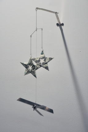 Abdullah M. I. Syed Twinkle Twinkle Little Drone - IV 2016 Altered toy mobile, banknotes, stainless steel, plastic and metal wire 16 x 6 in