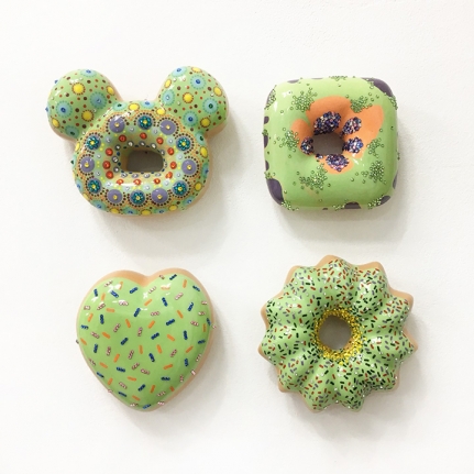 Four Green Donuts