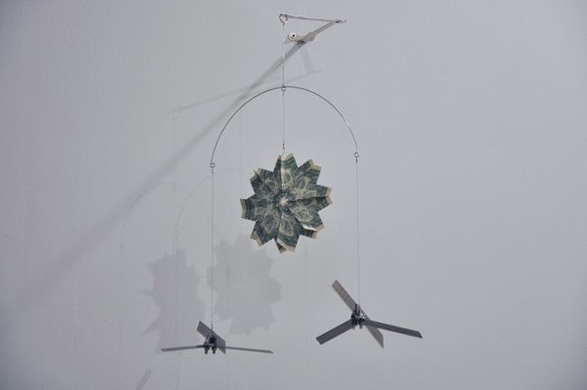 Abdullah M. I. Syed Twinkle Twinkle Little Drone - III 2016 Altered toy mobile, banknotes, stainless steel, plastic and metal wire 20 x 18 in