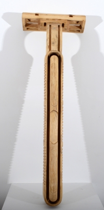 Debanjan Roy, Untitled (Shampoo Bottle), 2013, carved wood, 21 x 7 x 6 in