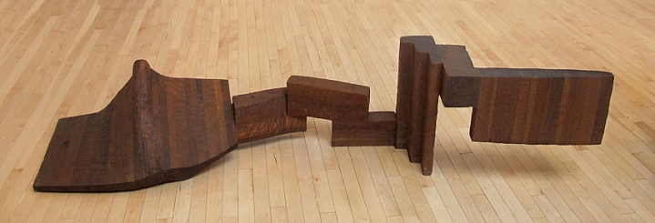 George Sugarman, Four Forms in Walnut, 1959, carved walnut, 19 1/2 x 86 x 20 in.