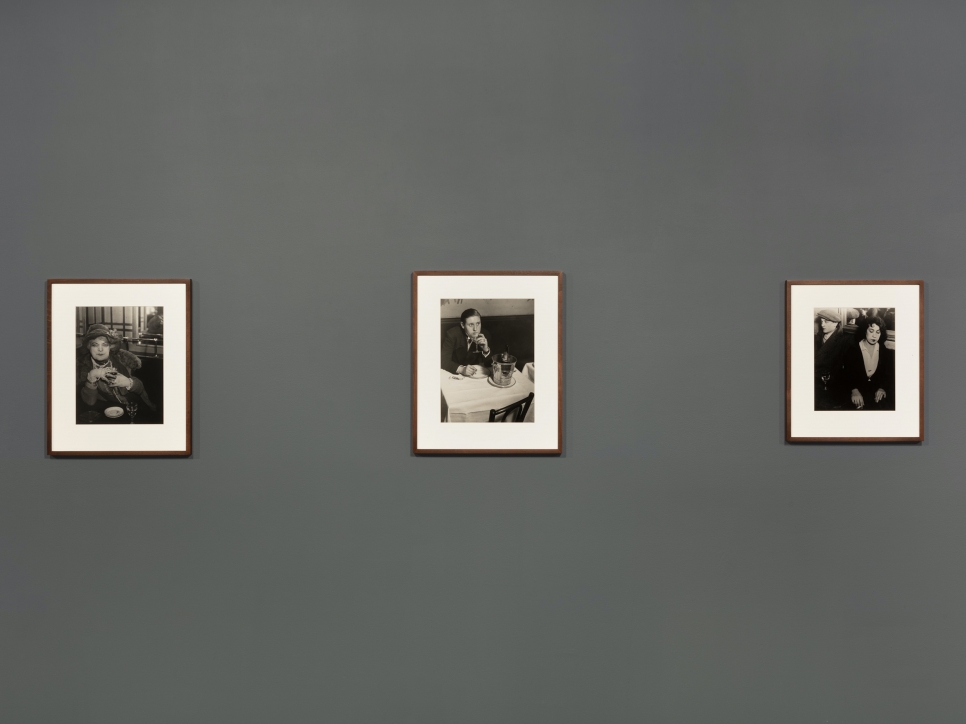 Installation view of black and white photographs by Brassaï