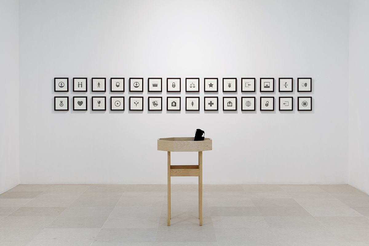 Allan McCollum & Matt Mullican, YOUR FATE, 2004, 28 framed graphite drawings, one table with felt inserts, booklet, dice, Table: 25 x 25 x 37 1/4 inches (66 x 66 x 94.6 cm), Paper: 8 x 8 (20.3 x 20.3 cm) each, Frame: 9 1/8 x 9 1/8 inches (23.2 x 23.2 cm) each