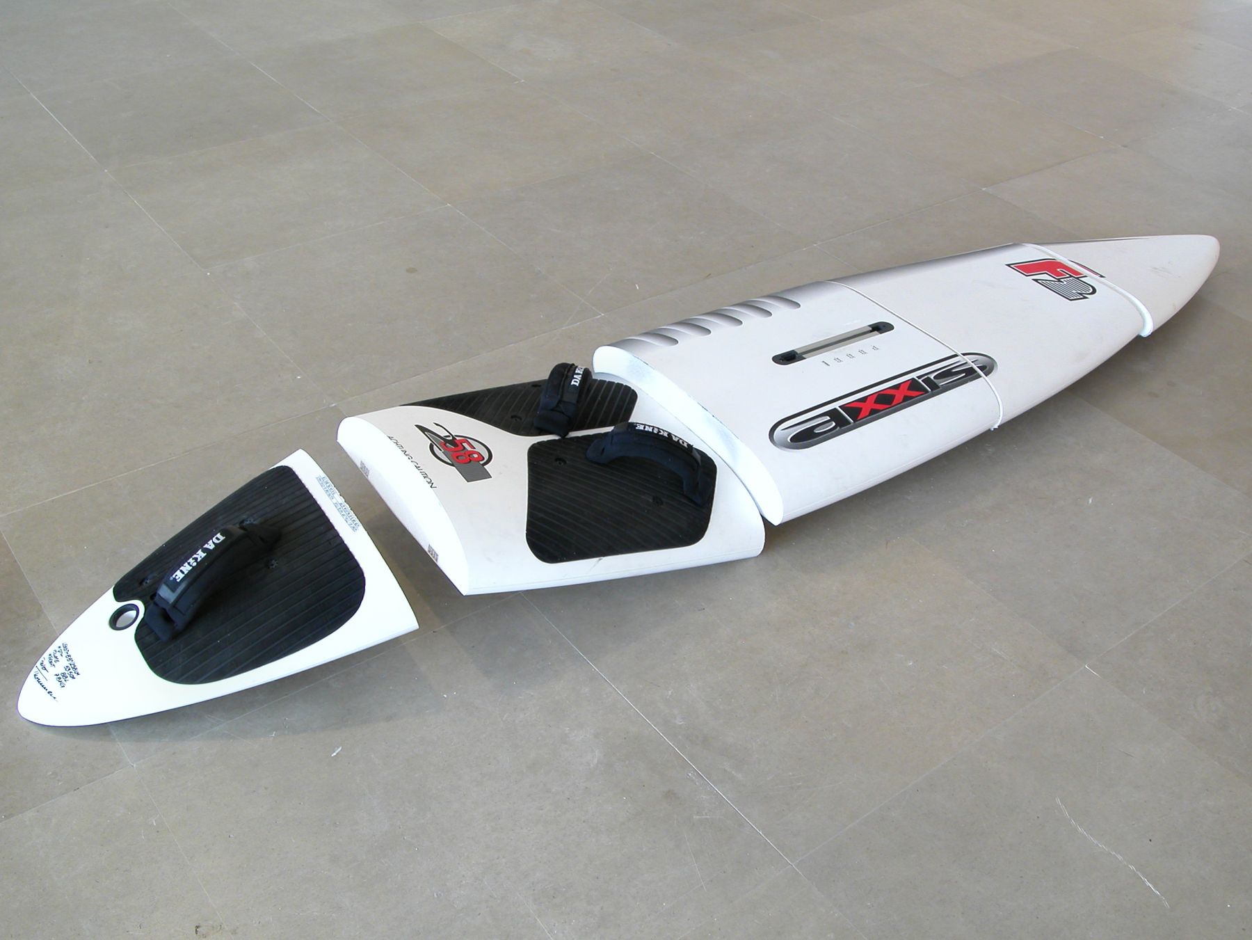 Michael Krebber, axxis, 2008, Windsurfing board, wall mounts, 21 x 158 inches
