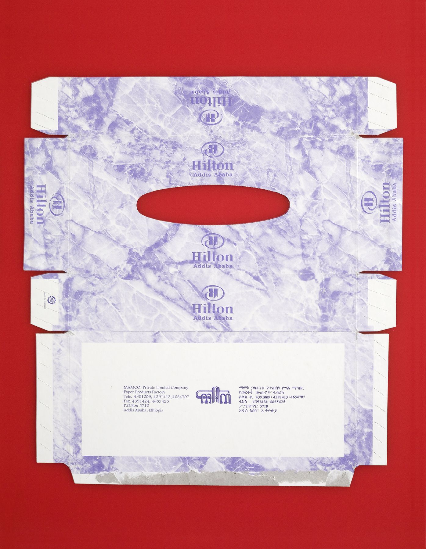 Hilton Addis Ababa Tissue, 2009, Plexiglas, printed cardboard, 18 x 15 3/4 inches