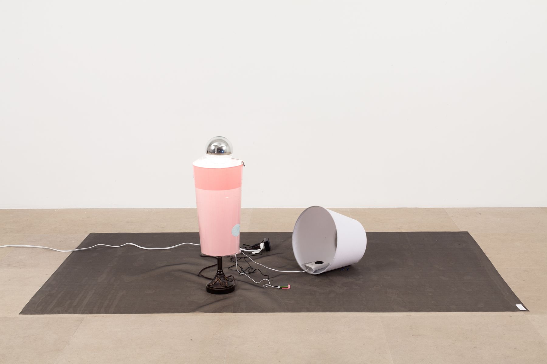 Josef Strau, Exercises, 2012, Poster, 2 lamps, sound on iPod, 2 speakers, dvd with 19 slides, and wire mesh, dimensions variable