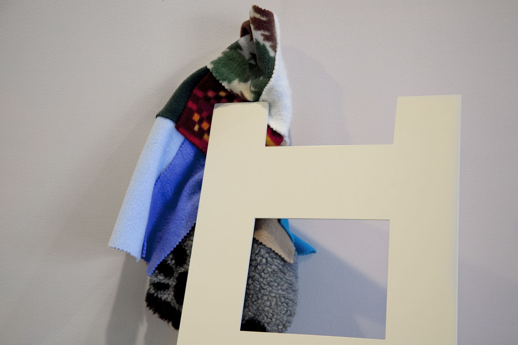 Helen Marten, Happy Drunks, Soggy Blueprints (6), 2011, detail, Radial bent powder-coated steel, printed vinyl, stitched fleece, 46 1/2 x 14 1/8 inches