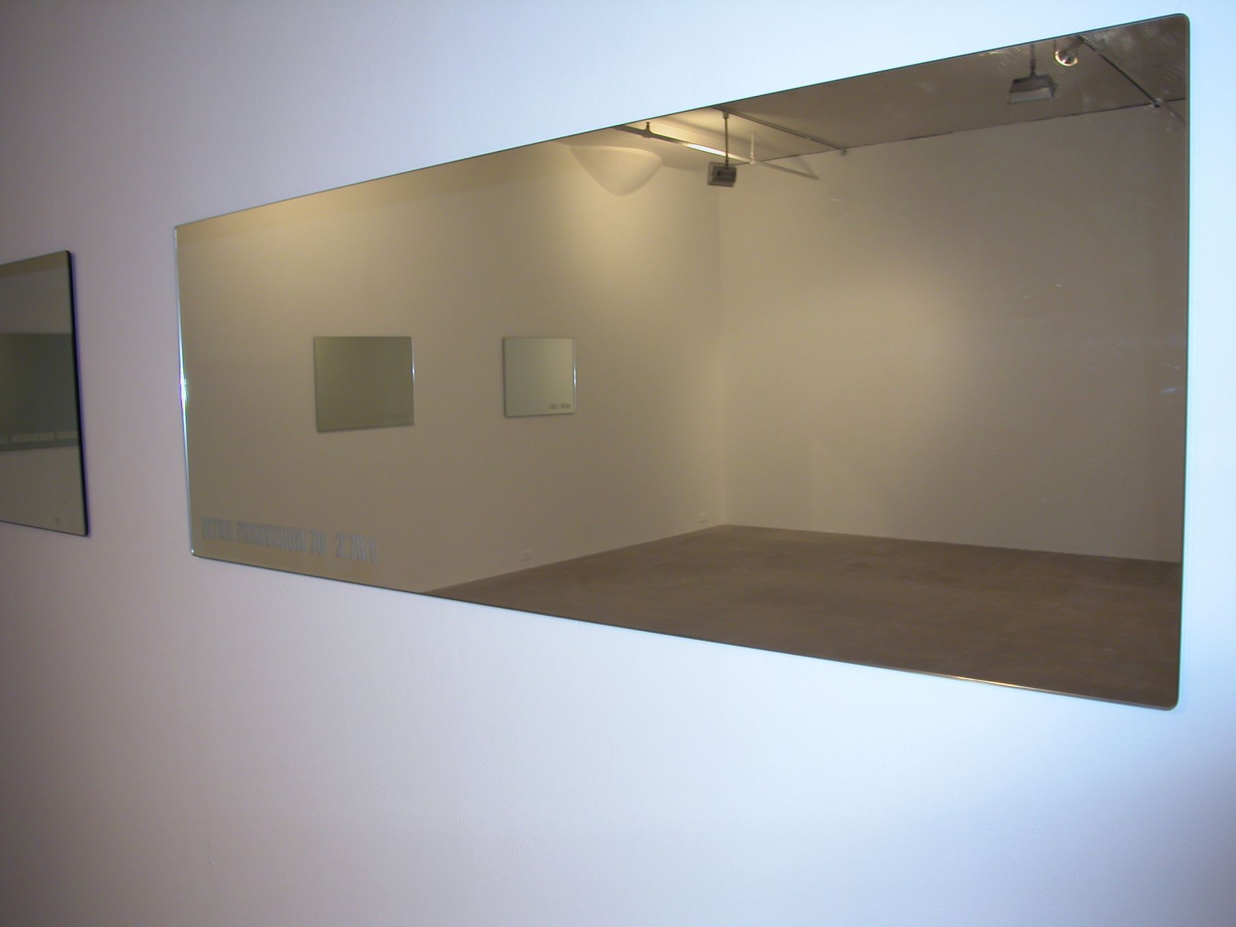 Ultra Panavision 70 2.76:1, 2004, mirrored glass, 24 x 66 1/4 inches 61 x 168.3 cm