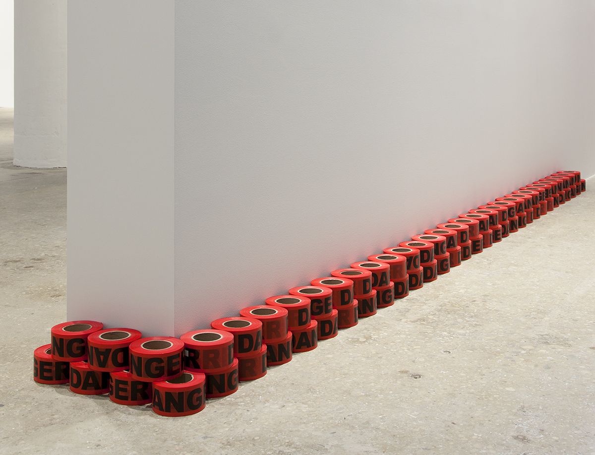 Danger, 2017 Danger tape, printed plastic 66 rolls: 2 7/8 x 5 3/4 inches (7.3 x 14.6 cm) each Overall dims: 5 3/4 x 198 x 5 3/4 inches (14.6 x 502.9 x 14.6 cm)