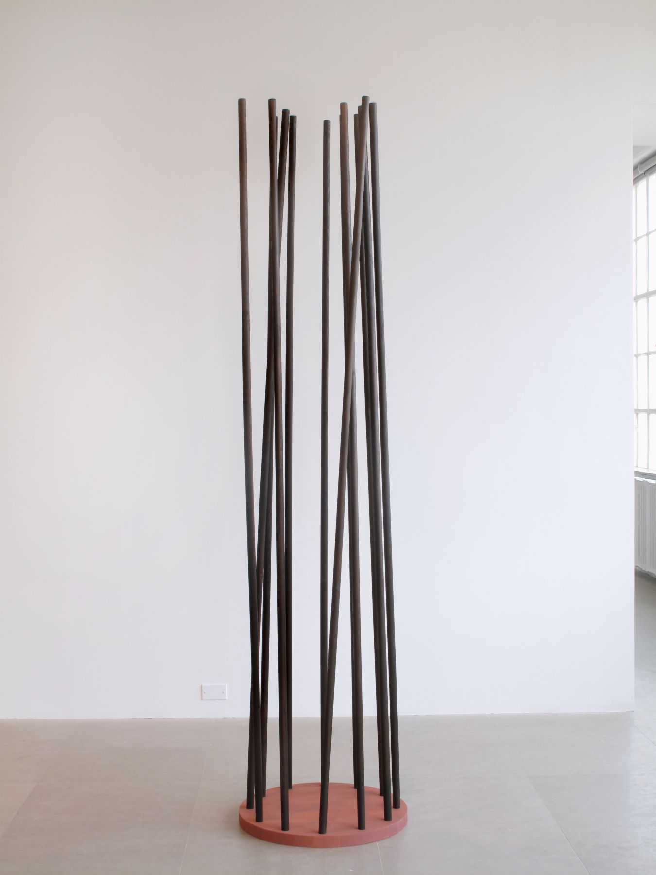 Trans Column 7 (tan and brown), 2009, wood, gouache, oil, 94 1/2 x 22 1/2 x 22 1/2 inches, Installation view, Greene Naftali, New York, 2009