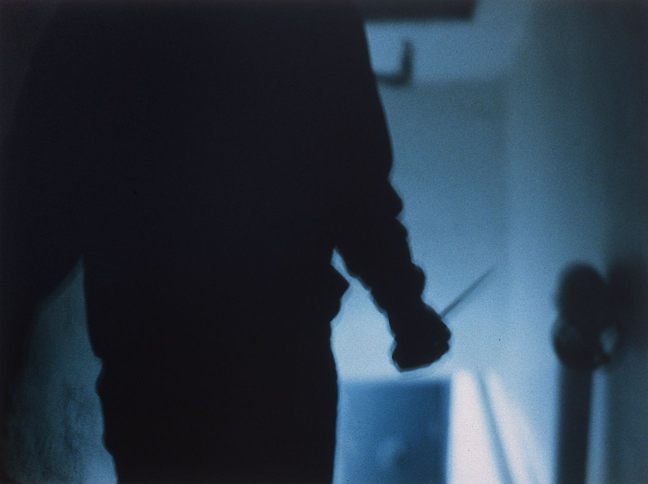 Josephine Meckseper, The Great Escape (Man with a knife), 1996, c-print, 30 x 40 inches