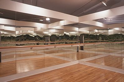 Installation view, Intermediate II, Greene Naftali, New York, 2001, portable ballet studio: wood, mirrors, oak bar, chrome fixtures, oak slat floor, 11 x 15 feet