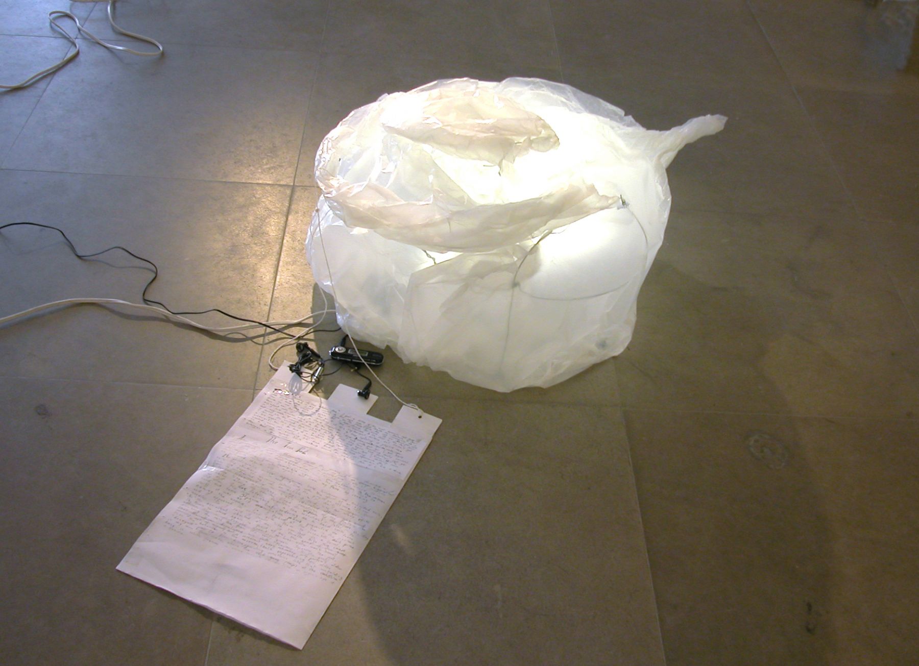 The Teapot, 2006, lamp with glassine, wire, and sound, 14 x 54 x 24 inches (35.6 x 137.2 x 61 cm)